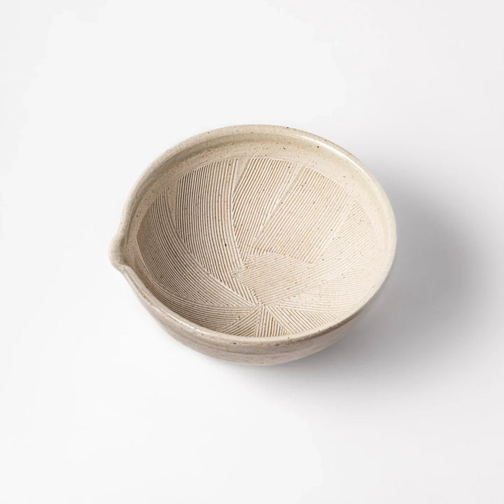Soft sage-colored mortar with a speckled Hiwa glaze and grooved interior, perfect for grinding sesame or spices.