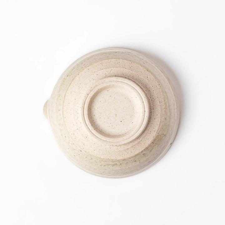 Soft sage-colored mortar with a speckled Hiwa glaze and grooved interior, perfect for grinding sesame or spices.