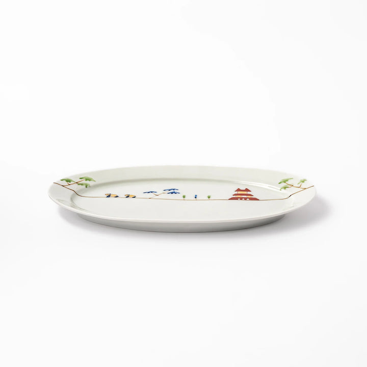 Japanese porcelain oval plate with whimsical China design featuring pandas, bamboo trees, and a traditional red pagoda