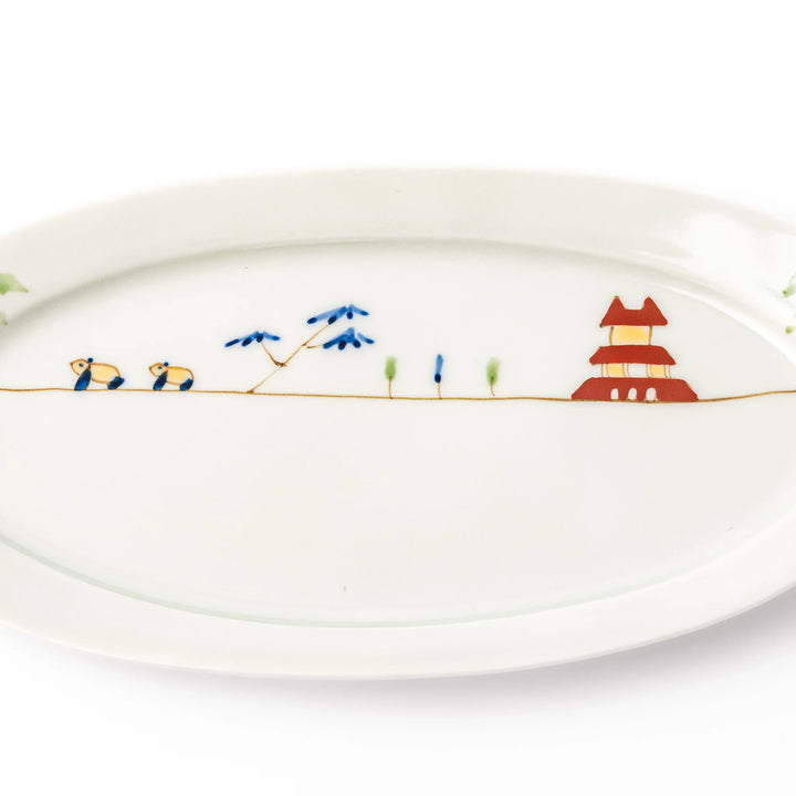 Japanese porcelain oval plate with whimsical China design featuring pandas, bamboo trees, and a traditional red pagoda