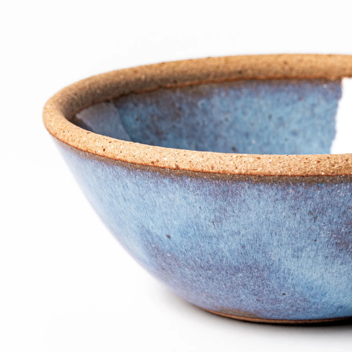 Terracotta blue ceramic dessert bowl with rustic brown rim, handcrafted in Japan for serving ice cream, fruit, soup, or side dishes.