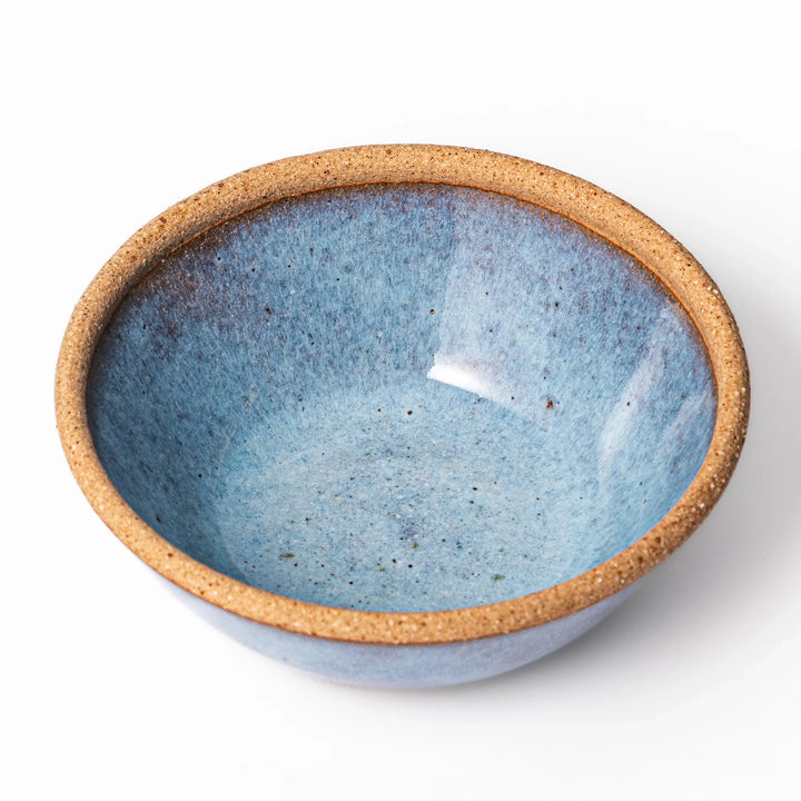 Terracotta blue ceramic dessert bowl with rustic brown rim, handcrafted in Japan for serving ice cream, fruit, soup, or side dishes.