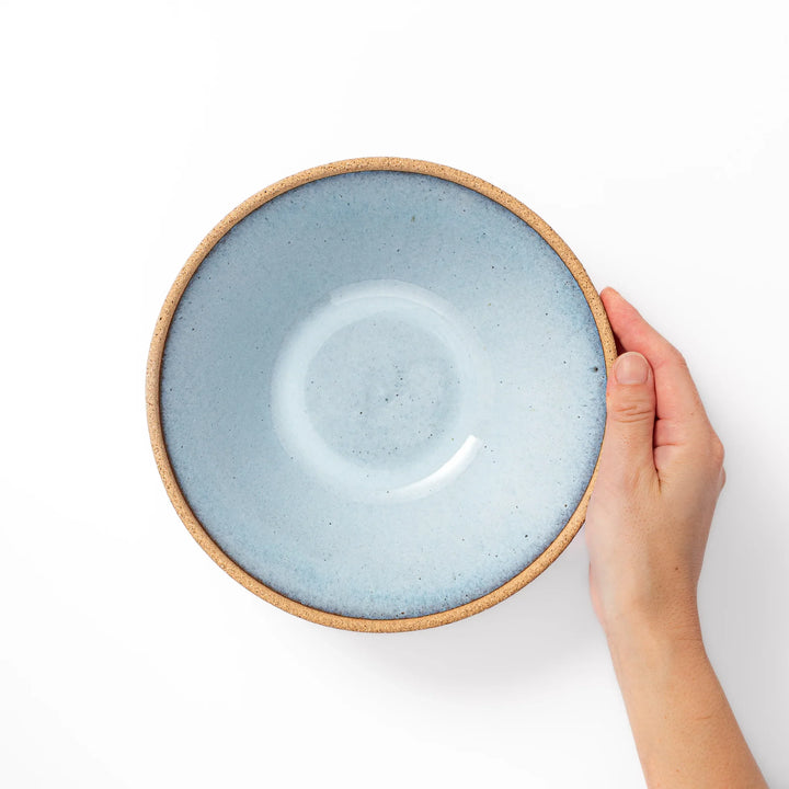Terracotta blue ceramic pasta bowl with rustic brown rim, handcrafted in Japan for serving pasta, curry, salad, or versatile everyday meals.