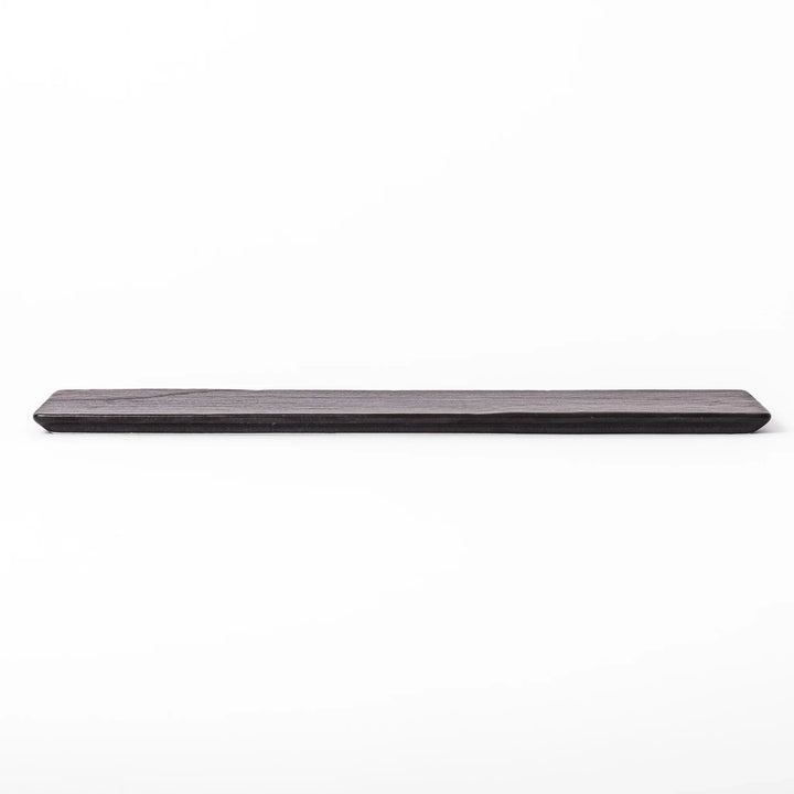 Rectangular black ceramic serving plate with a subtle ridged woodgrain texture, perfect for stylish Japanese meals and contemporary plating.