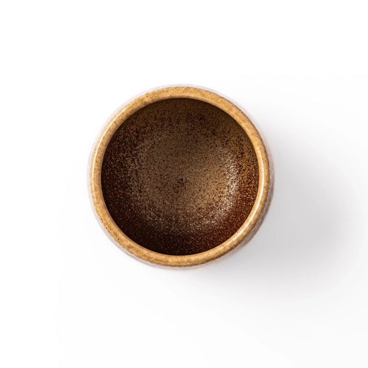 Two-tone Japanese ceramic rice storage bowl with lid, featuring smooth glazed top and textured brown lower half for rustic charm.