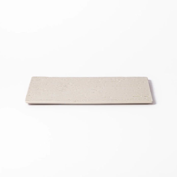 Textured white ceramic dinner plate with a subtle woodgrain pattern, ideal for elegant Japanese table settings and modern minimalist dining.