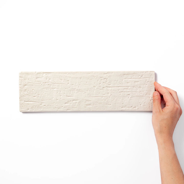 Textured rectangular white ceramic serving plate with a woodgrain-like pattern, perfect for minimalist Japanese table settings or modern kitchens.