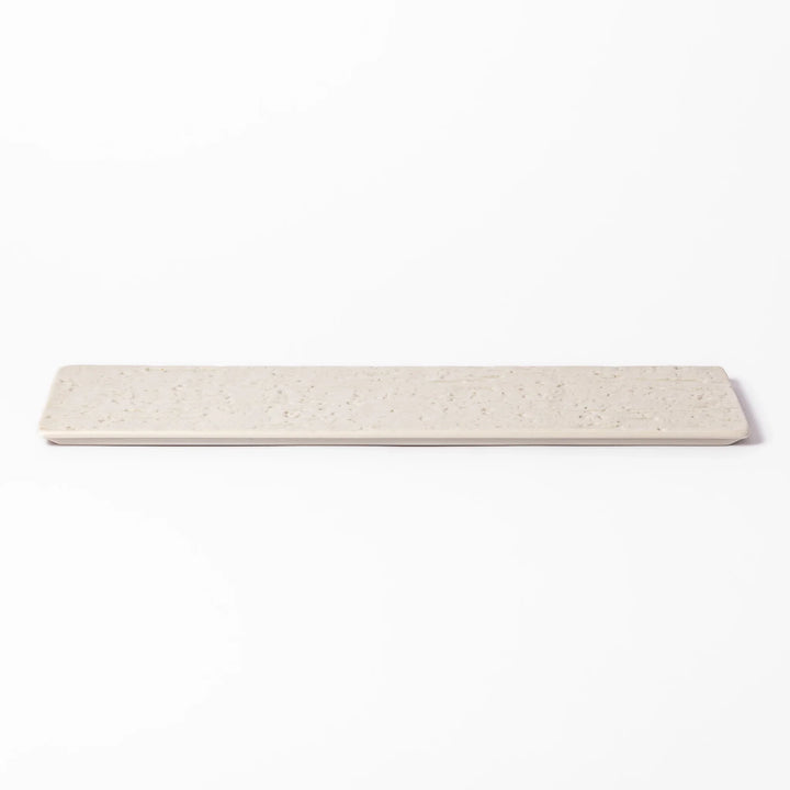 Textured rectangular white ceramic serving plate with a woodgrain-like pattern, perfect for minimalist Japanese table settings or modern kitchens.