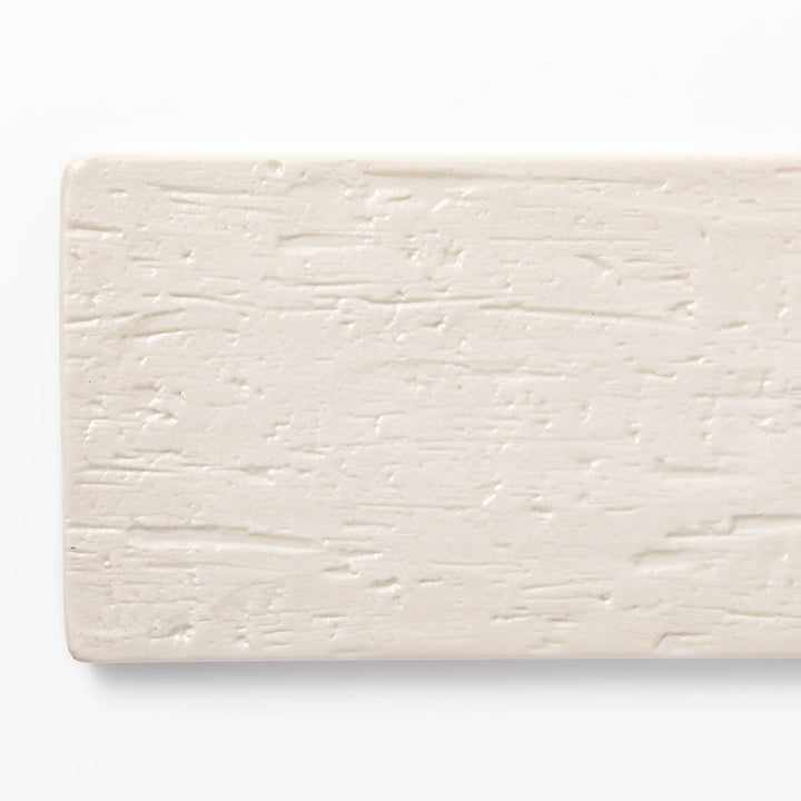 Textured rectangular white ceramic serving plate with a woodgrain-like pattern, perfect for minimalist Japanese table settings or modern kitchens.