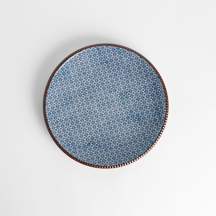 Blue and white patterned Dinner Plate featuring a delicate floral design and a brown textured rim, perfect for elegant dining settings.