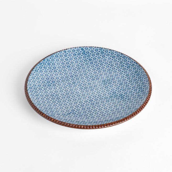 Blue and white patterned Dinner Plate featuring a delicate floral design and a brown textured rim, perfect for elegant dining settings.