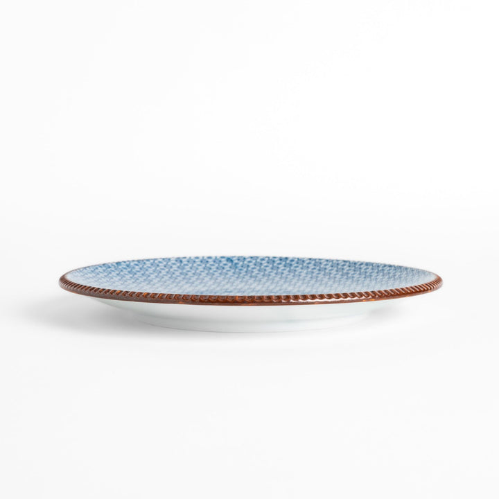 Blue and white patterned Dinner Plate featuring a delicate floral design and a brown textured rim, perfect for elegant dining settings.