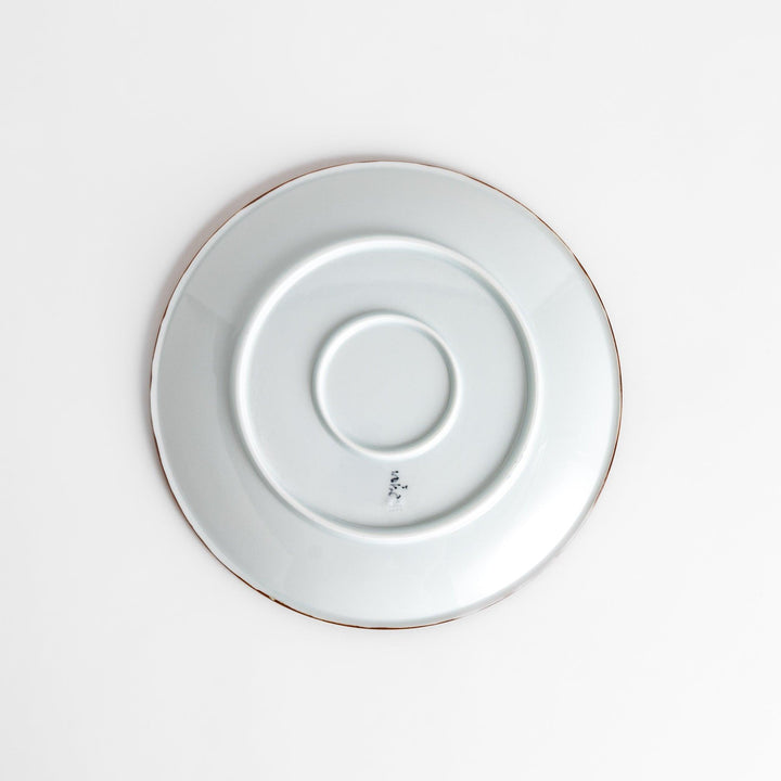 Blue and white patterned Dinner Plate featuring a delicate floral design and a brown textured rim, perfect for elegant dining settings.