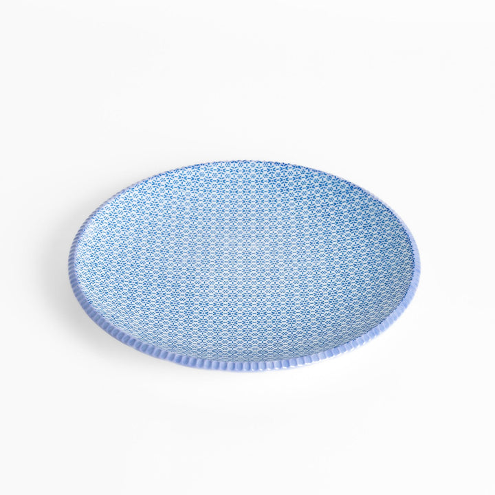 Blue and white floral patterned Dinner Plate with a subtle striped rim, offering an elegant touch for refined dining presentations.