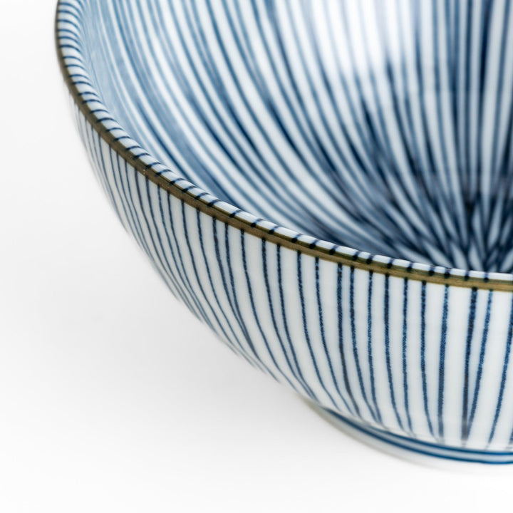 Ramen bowl featuring delicate blue vertical stripes with a gold accent at the rim, perfect for adding a touch of elegance to any meal.