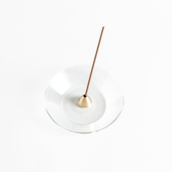 Modern glass Incense Holder with brass accent, a stylish way to enjoy your favorite scents.