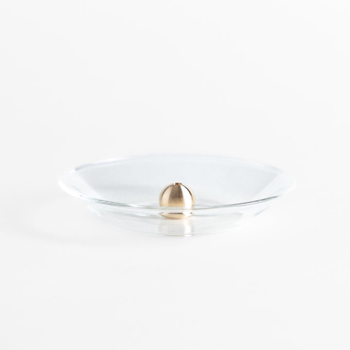 Modern glass Incense Holder with brass accent, a stylish way to enjoy your favorite scents.