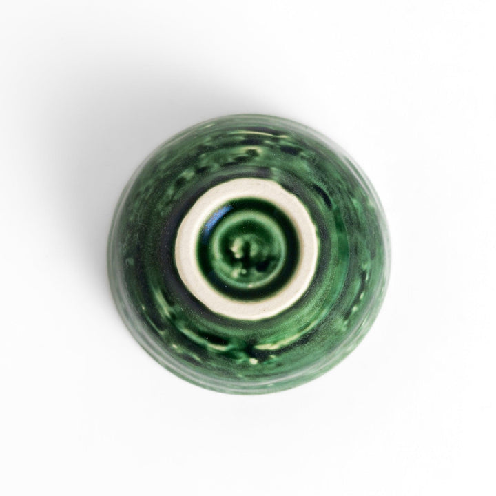 Deep green ceramic sake cup with a glossy textured finish and rounded shape, ideal for enjoying traditional Japanese sake rituals.