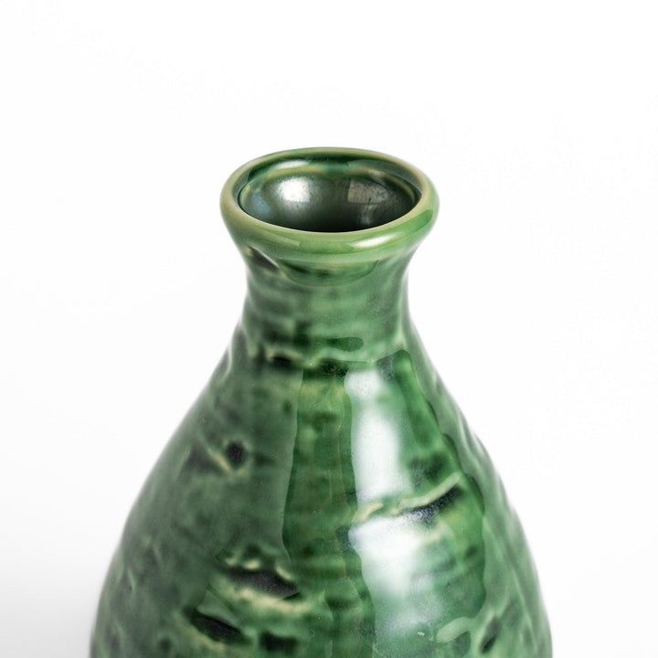 Glossy deep green ceramic sake flask with a textured finish and classic silhouette, perfect for serving traditional warm or chilled sake.