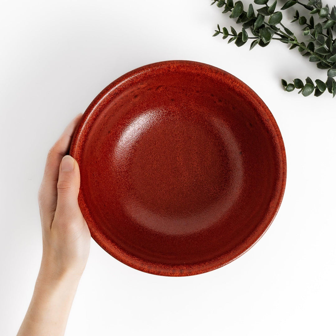 Ramen bowl with a striking ember glaze featuring a dark, smooth base and a vibrant reddish-orange finish on the upper rim.