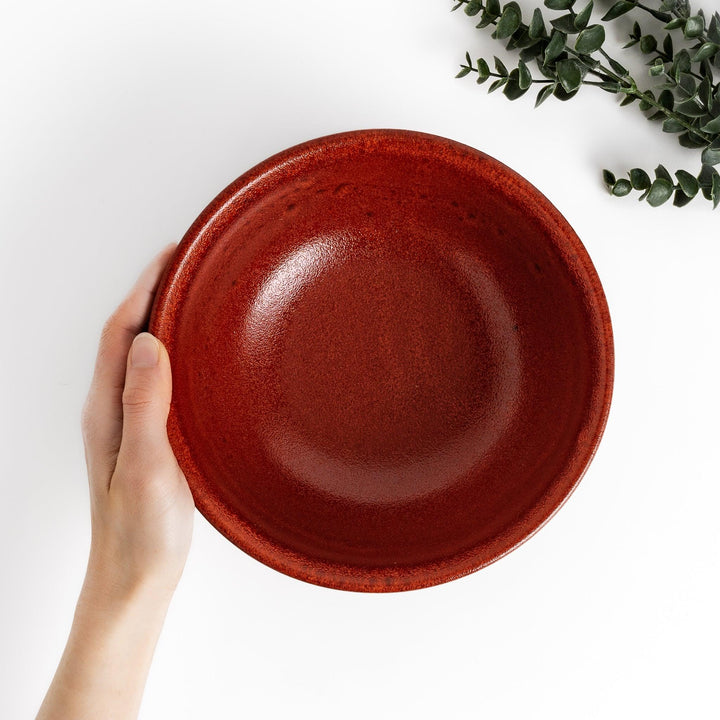 Ramen bowl with a striking ember glaze featuring a dark, smooth base and a vibrant reddish-orange finish on the upper rim.