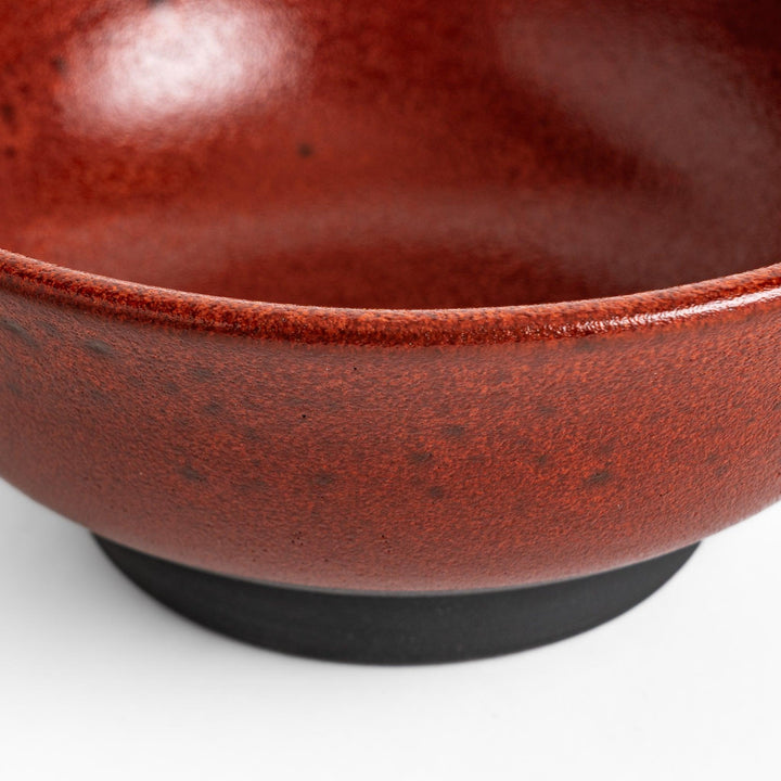 Ramen bowl with a striking ember glaze featuring a dark, smooth base and a vibrant reddish-orange finish on the upper rim.