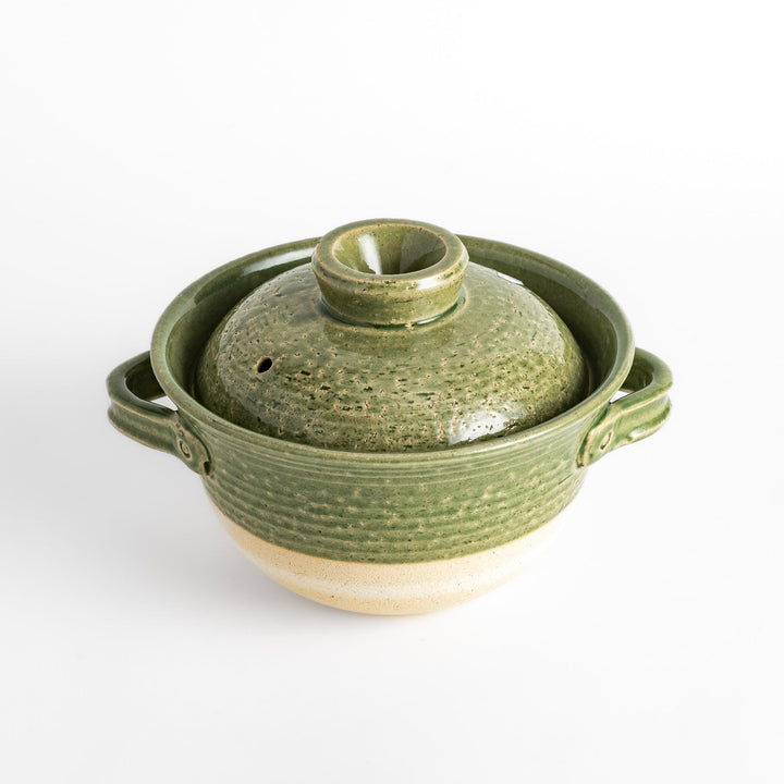 Emerald 3-Cup Rice Donabe, a traditional Japanese clay pot with a green glazed exterior and a round lid, perfect for cooking rice with authentic flavor.