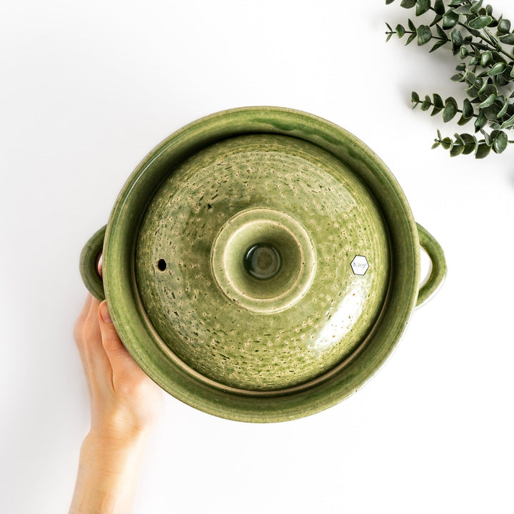 Emerald 3-Cup Rice Donabe, a traditional Japanese clay pot with a green glazed exterior and a round lid, perfect for cooking rice with authentic flavor.