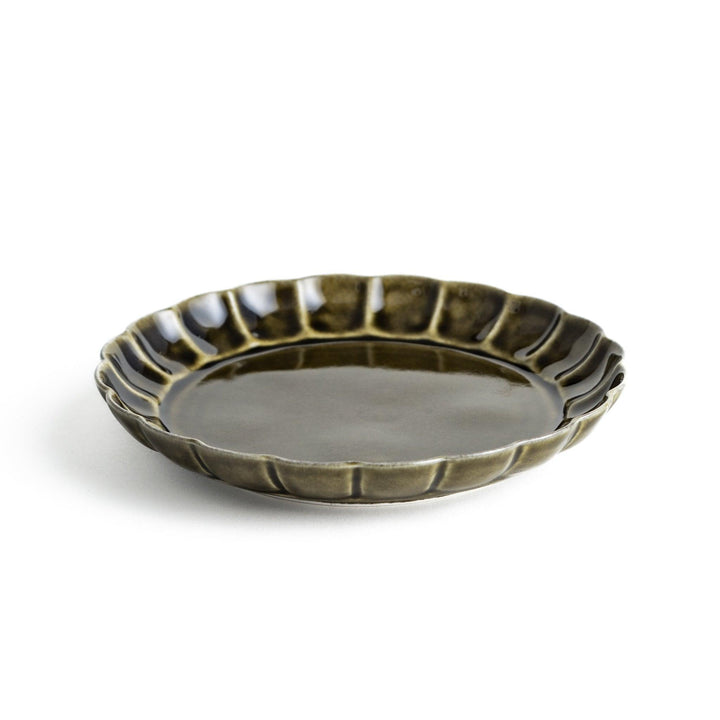 Round, dark brown or olive colored dessert plate with a scalloped edge, featuring a glossy finish.