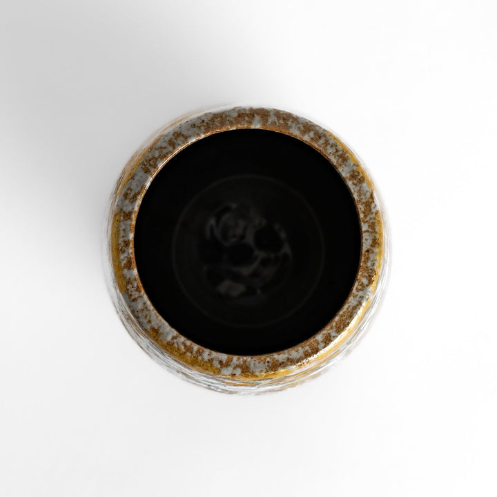 Flower Vase featuring a hand-painted design of blooming flowers and a bird perched on a tree, with warm golden and green tones.