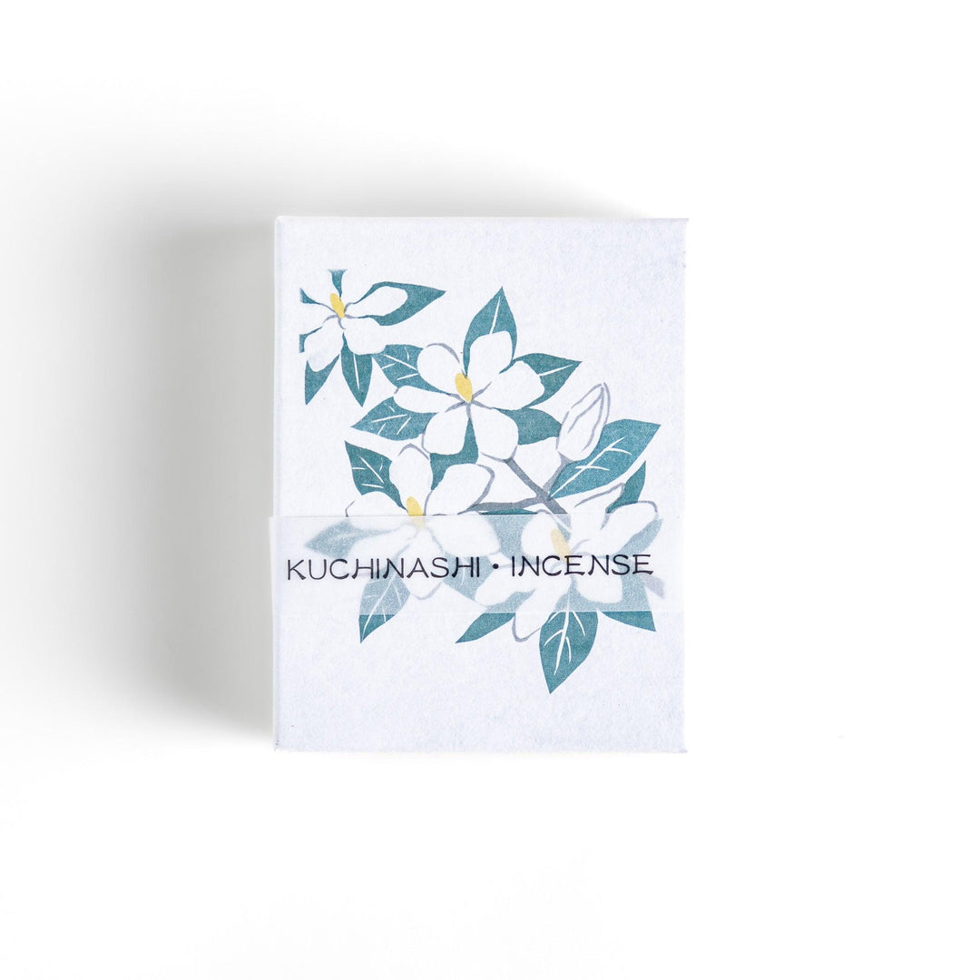 Incense featuring warm beige sticks in a box adorned with an elegant gardenia flower illustration, offering a rich, sweet floral fragrance for a soothing ambiance.