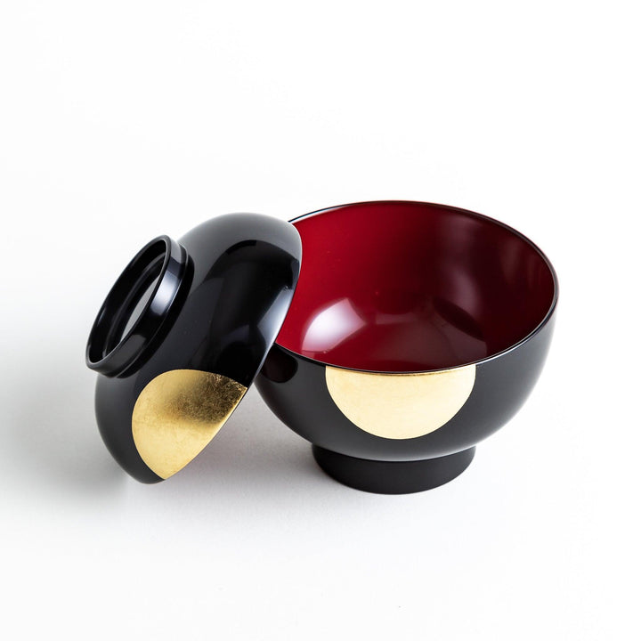 Traditional black lacquer bowl with a golden moon motif on the exterior, featuring a smooth, glossy finish.
