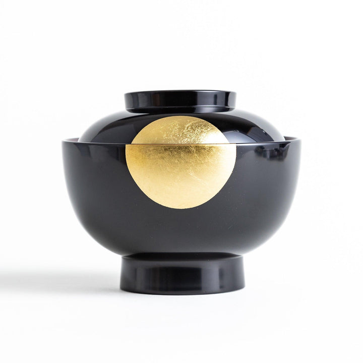 Traditional black lacquer bowl with a golden moon motif on the exterior, featuring a smooth, glossy finish.