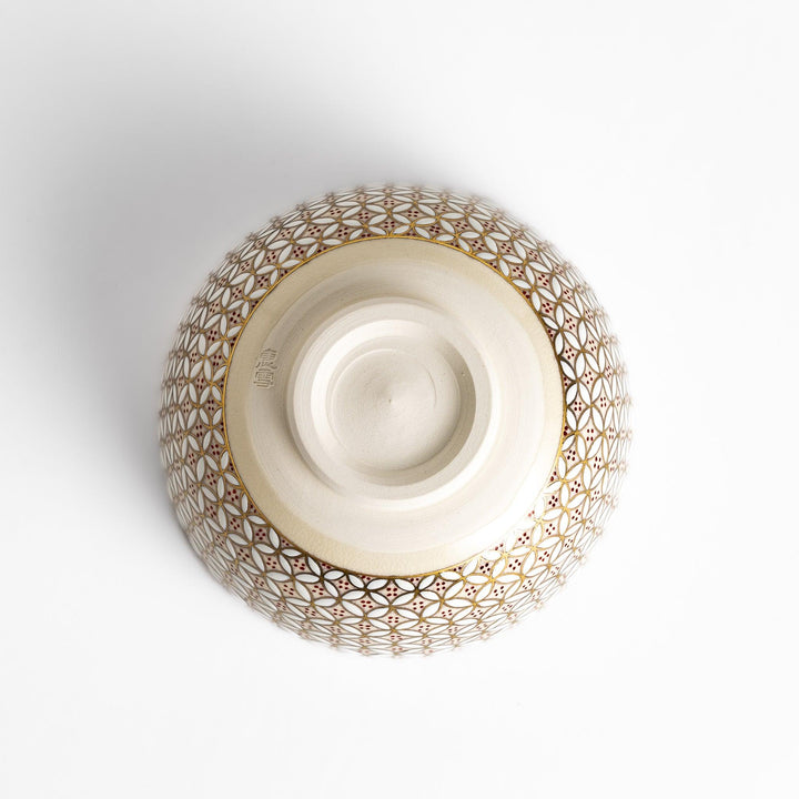 Golden Treasure Matcha Bowl with an intricate geometric pattern in gold and red, perfect for enjoying matcha in a stylish and traditional way.