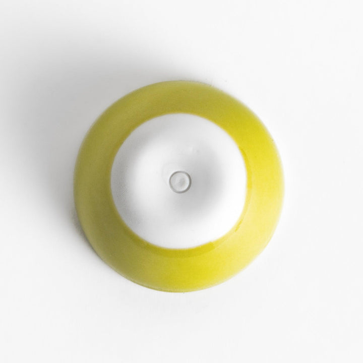 Green Apple Lidded Condiment Bowl, a charming ceramic bowl with a glossy green finish and a small black stem, perfect for serving sauces and condiments.