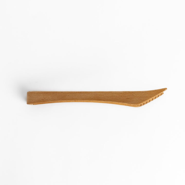 Elegant handcrafted wooden tongs with a smooth finish and angled tips, perfect for serving and handling food in a stylish way.