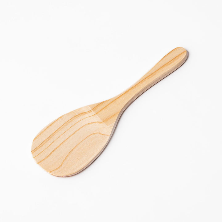 Smooth hinoki wood rice paddle with a natural grain finish, perfect for mixing and serving rice while preserving its texture and aroma.