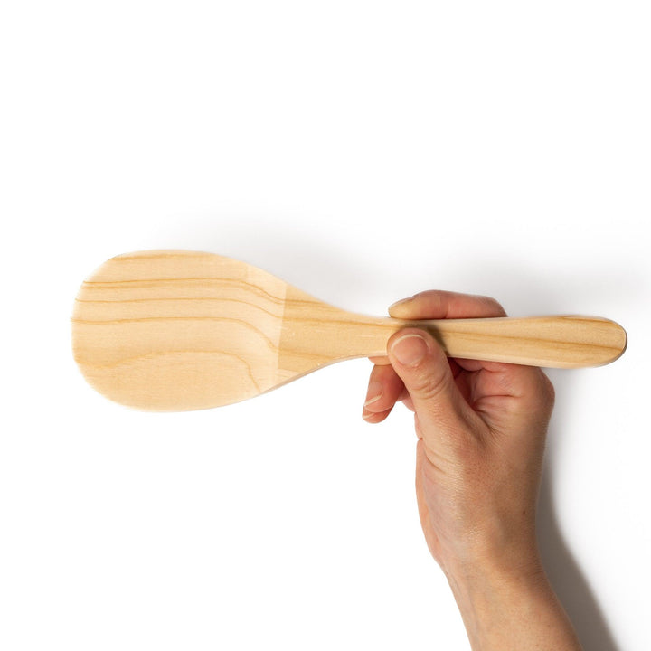 Smooth hinoki wood rice paddle with a natural grain finish, perfect for mixing and serving rice while preserving its texture and aroma.