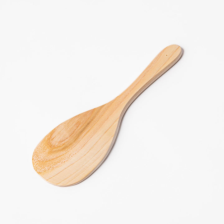 Smooth hinoki wood rice paddle with a natural grain finish, perfect for mixing and serving rice while preserving its texture and aroma.