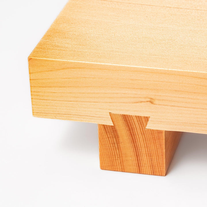 Rectangular hinoki wood sushi plate with clean lines and raised legs, perfect for serving sushi or appetizers with a refined traditional aesthetic.