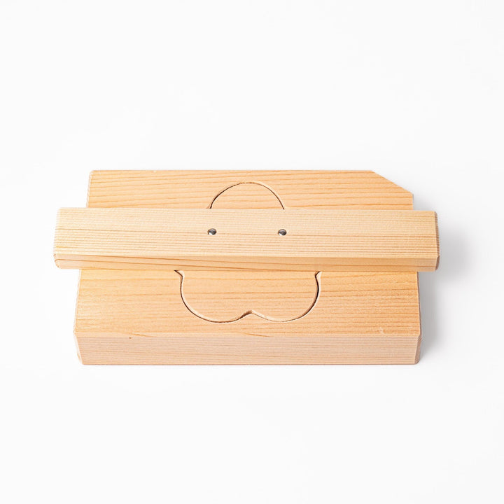 Hinoki wood onigiri mold in a plum blossom shape, ideal for pressing rice into floral forms with a gentle aroma and traditional Japanese charm.