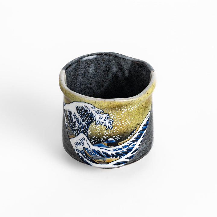 Tea Cups featuring Hokusai's Great Wave design, with vibrant blue waves and a golden gradient background.