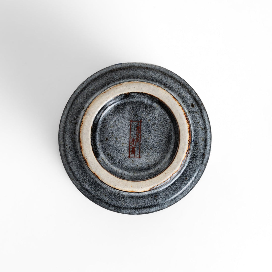 Tea Cups featuring Hokusai's Great Wave design, with vibrant blue waves and a golden gradient background.