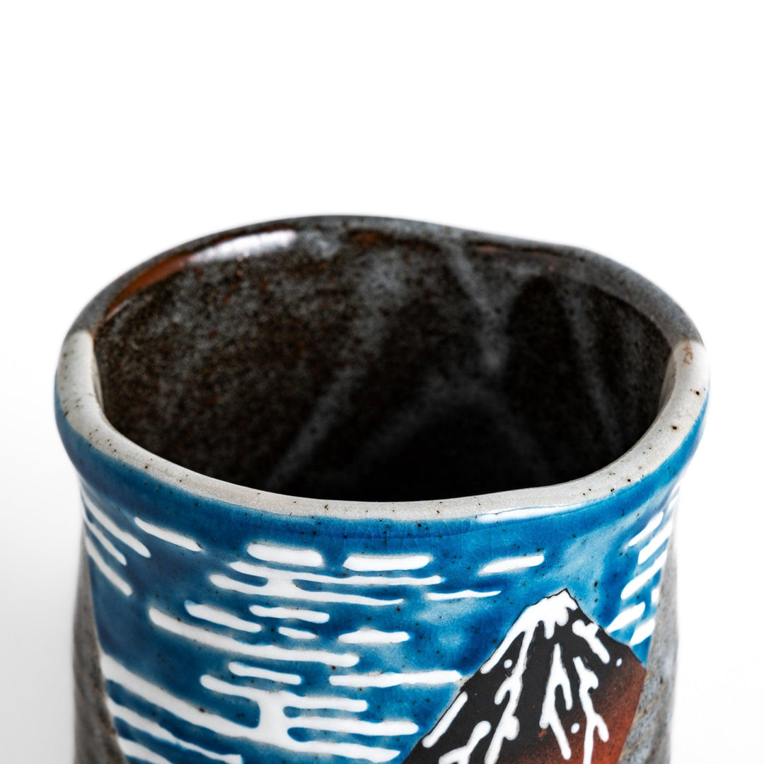 Tea Cups featuring Hokusai's Red Mount Fuji design, with vibrant red, blue, and white colors for a striking display.