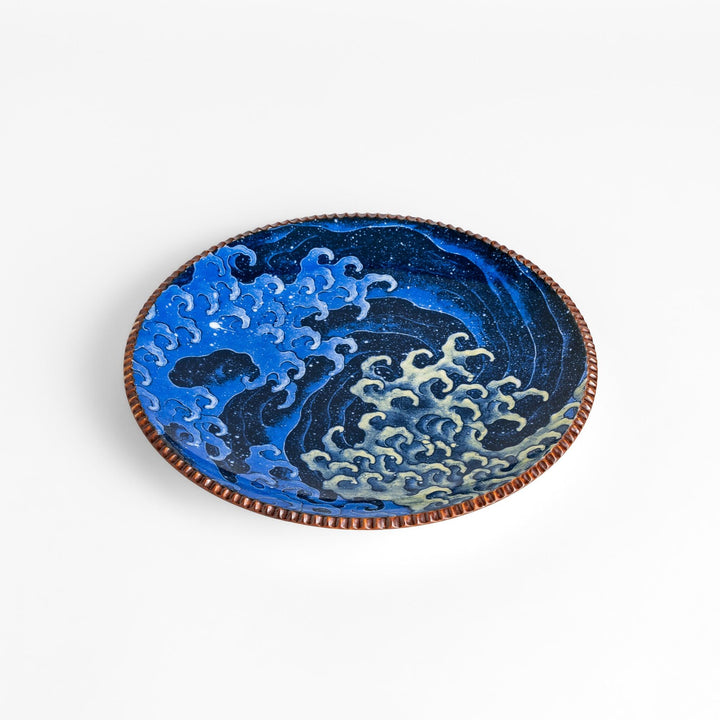 Beautiful ceramic salad plate, featuring a hand-painted Hokusai-inspired wave design, elevates any meal.