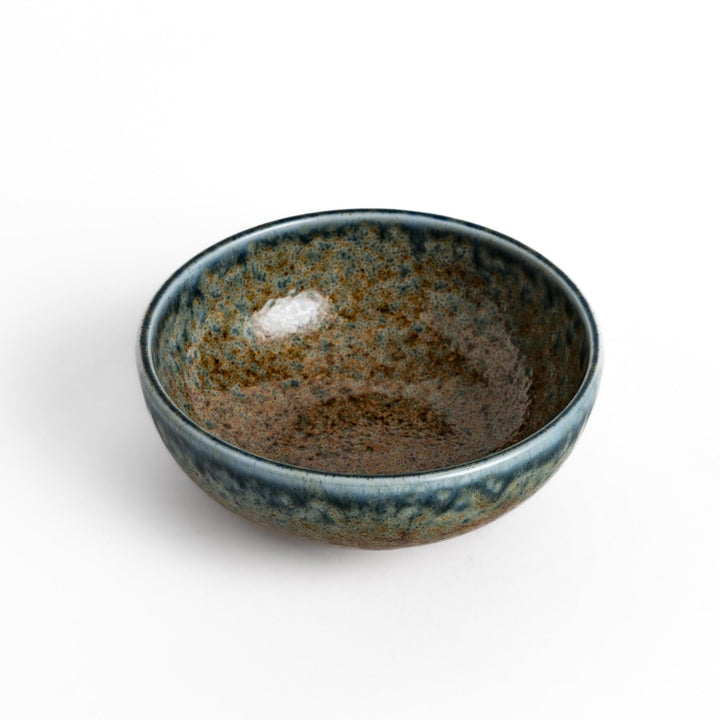 Dessert bowl featuring a beautiful indigo glaze with a stunning ombré effect, transitioning from deep blue to earthy brown