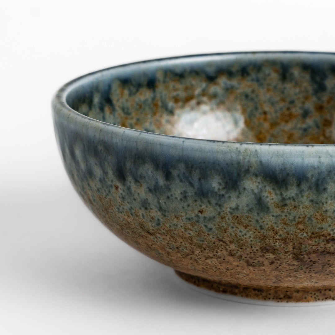 Dessert bowl featuring a beautiful indigo glaze with a stunning ombré effect, transitioning from deep blue to earthy brown