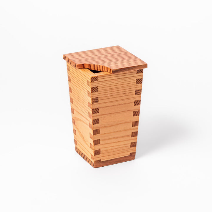 Japanese cedar sake carafe with square lid and visible joinery, combining natural wood texture with traditional craftsmanship for authentic sake service.