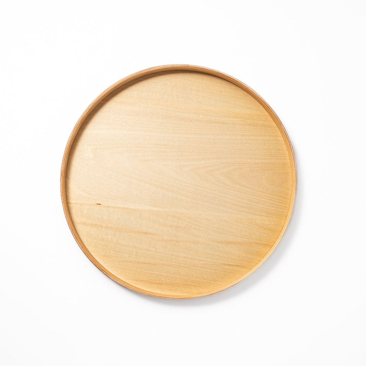 Minimalist Japanese round wooden tray with raised edge, crafted from natural wood, perfect for serving tea, snacks, or organizing small items.