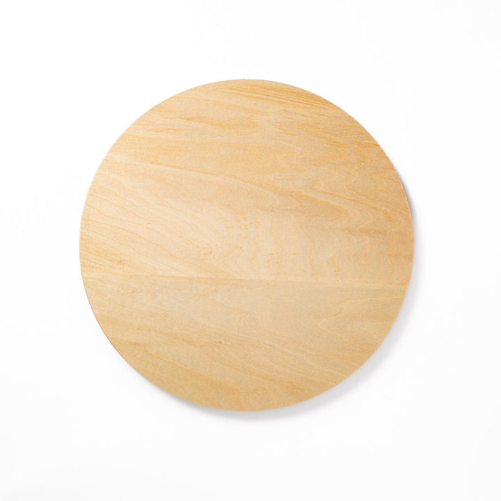 Minimalist Japanese round wooden tray with raised edge, crafted from natural wood, perfect for serving tea, snacks, or organizing small items.